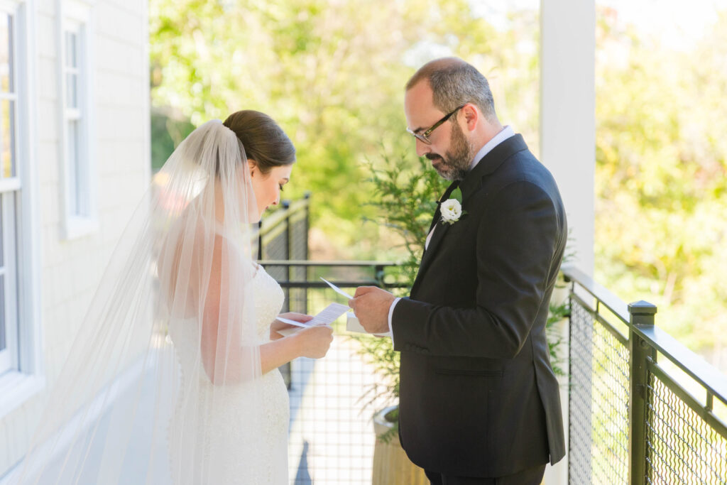 A quiet, emotional moment as the bride and groom read private letters to one another before their Pennsylvania wedding ceremony.