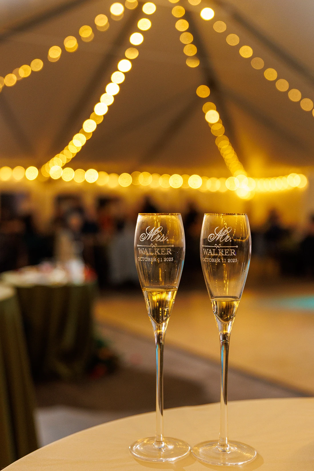 Champagne glasses under the tent