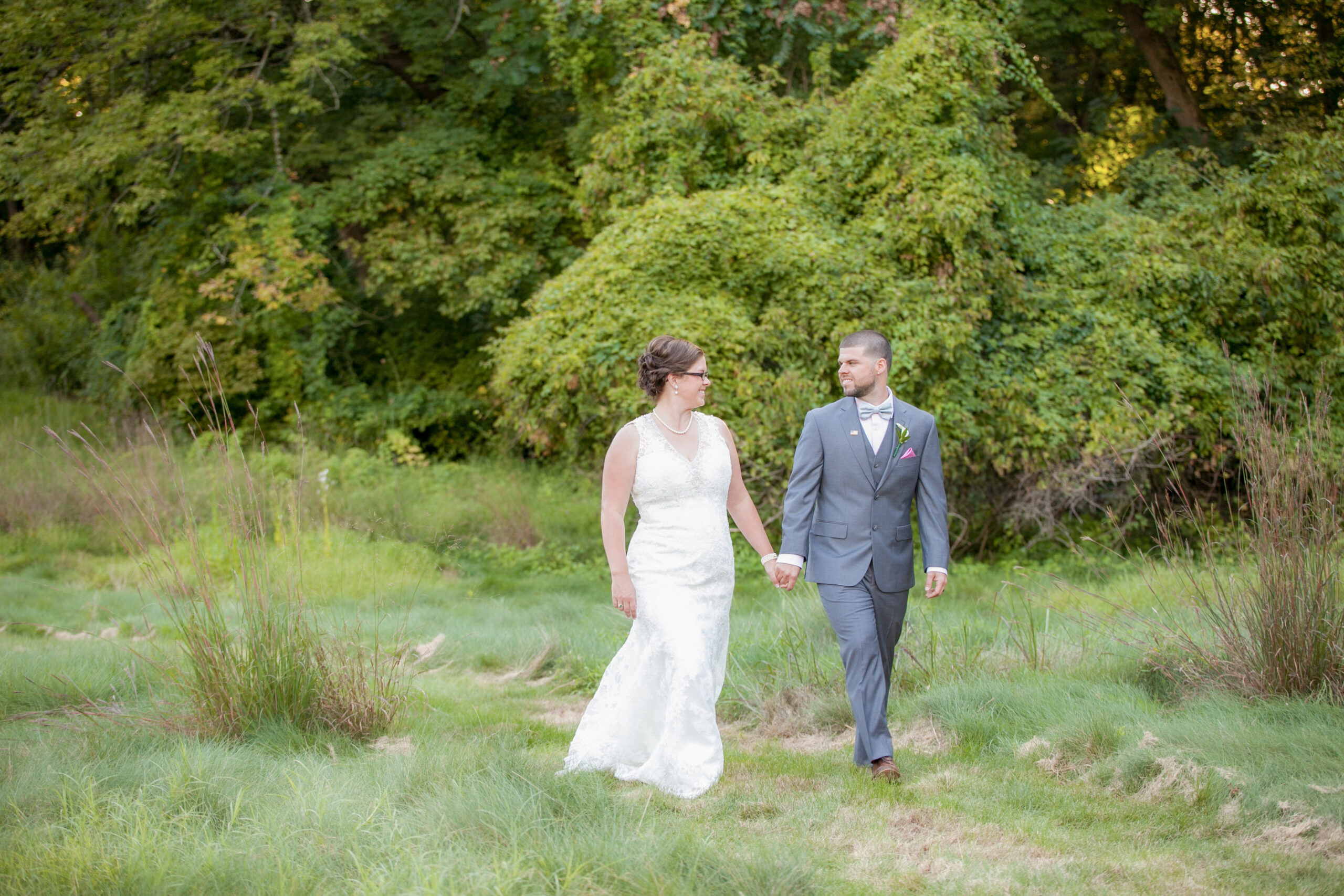 Bride and groom walking at Brantwyn Estate wedding venue in Wilmington Delaware